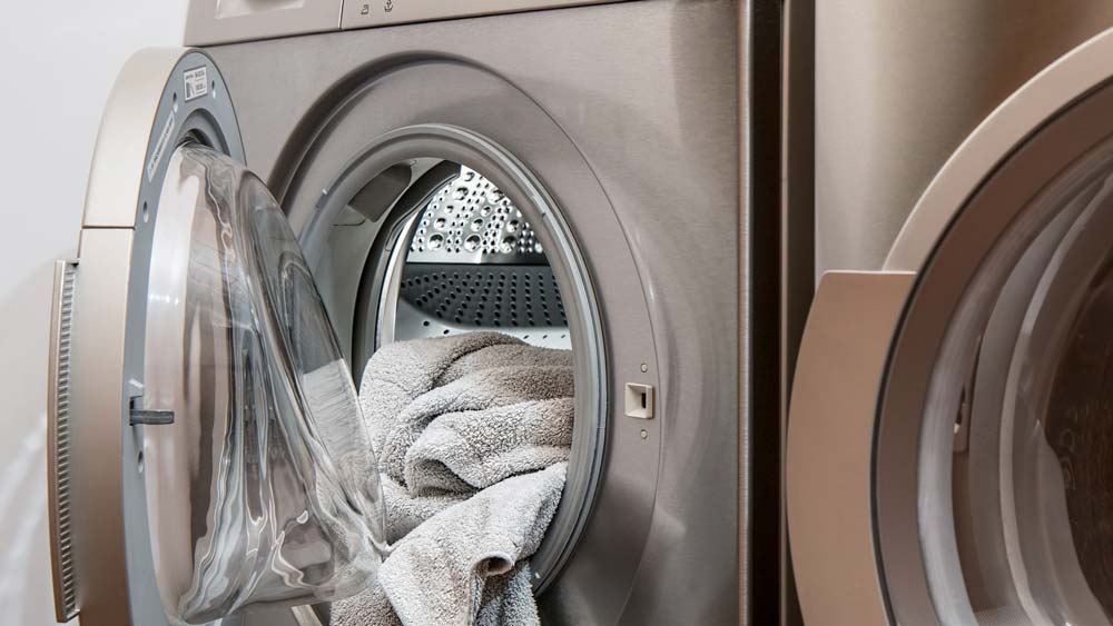 Washing machine full of clean towels